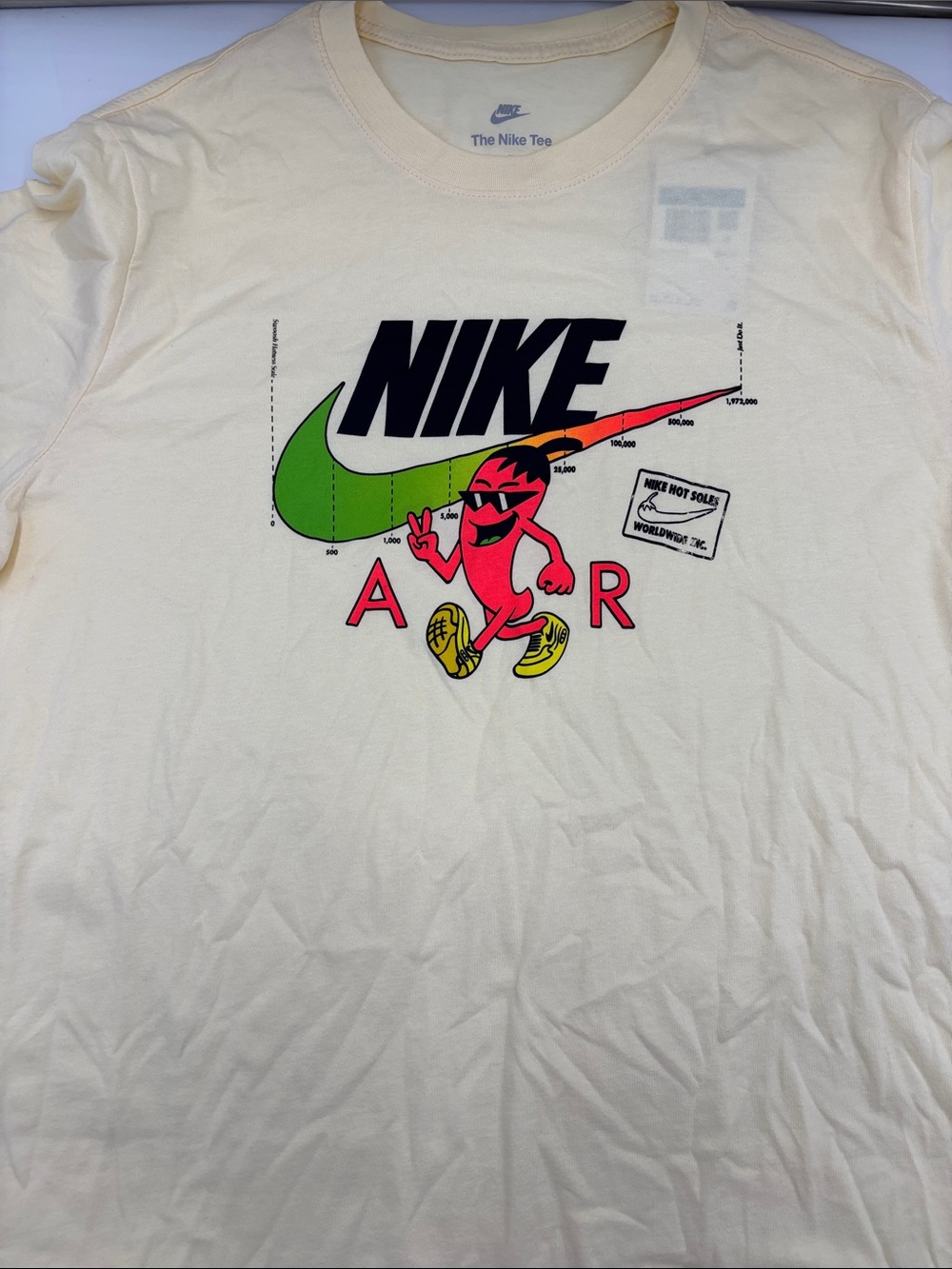 Nike Moto Graphic Tee in Muslin